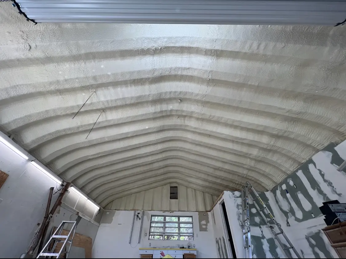 Spray polyurethane foam applied to the underside of a metal roof deck in North Whitehall